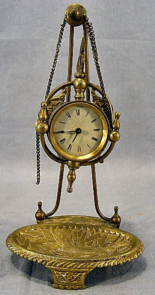 Brass Parker desk clock on stand, 9.5" high, origi: Brass Parker desk clock on stand, 9.5" high, original key, not running