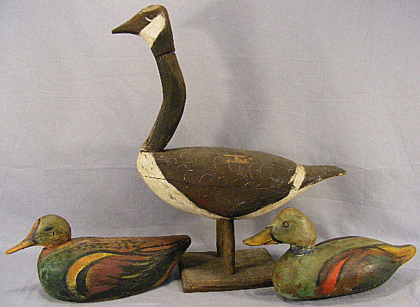 Lot of three decoys, Canada goose 21" high & 17" : Lot of three decoys, Canada goose 21" high & 17" long, chip on head and two decoys with over painting