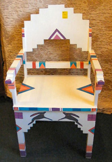 Painted chair w/ Indian motif by the Alvarez brot: Painted chair w/ Indian motif by the Alvarez brothers in Santa Fe New Mexico. 38.5" tall x 22" wide x 20" deep.