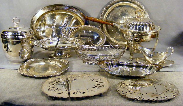 Large lot of misc. silverplate including, 15.75": Large lot of misc. silverplate including, 15.75" meat platter, round tray, two trivets, bread bowls, basket, ice bucket, chafing dish, etc. Most in excellent condition.