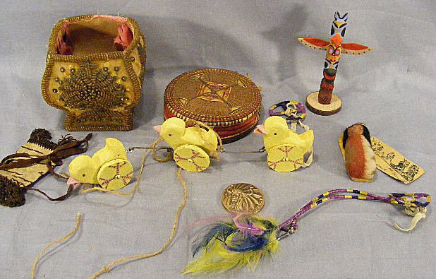 Misc. lot, Skookum type papoose doll, Sioux City : Misc. lot, Skookum type papoose doll, Sioux City Iowa bronze medal 1976. Iroquois basket (damage), ducks, totem pole, etc.