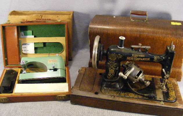 2 sewing machines. New Companion w/ Hamilton Beac: 2 sewing machines. New Companion w/ Hamilton Beach motor & Bell Portable. (Both sold as is).
