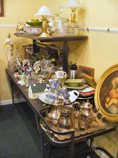 Table lot, misc. glass & china, book ends, tea ca: Table lot, misc. glass & china, book ends, tea cart, silverplate, etc. Large lot.