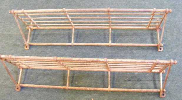 Pair of wall mounted iron hat & coat racks. 35.5" : Pair of wall mounted iron hat & coat racks. 35.5" long.