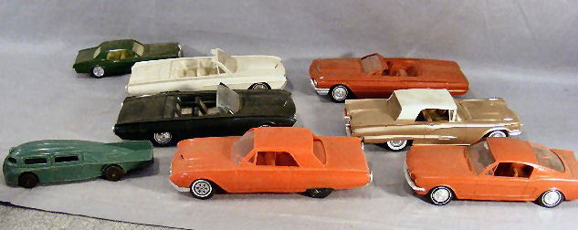 Plastic dealer promotional cars, (4 Ford Thunderb: Plastic dealer promotional cars, (4 Ford Thunderbirds, 2 are friction cars, damaged), White metal Manoil #706 fantasy Art Deco car and 3 other models.