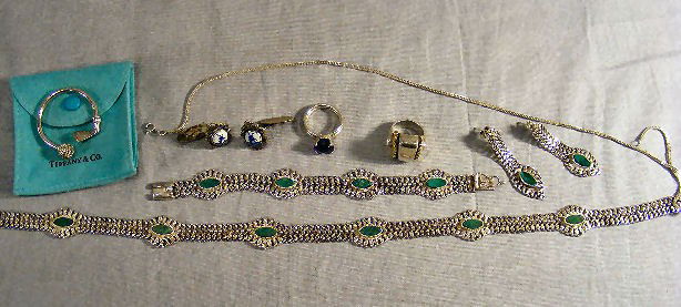 Sterling jewelry lot. Necklace, bracelet & earrin: Sterling jewelry lot. Necklace, bracelet & earring set from Peru marked 925. Tiffany & Co. golf key ring, 2 rings, Deft style cufflinks, necklace. 4.26 OZT