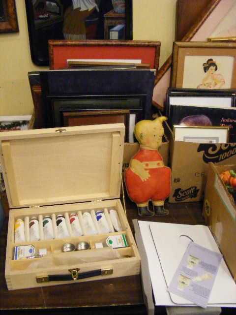 2 boxes of frames, Christmas prints, Asian print: 2 boxes of frames, Christmas prints, Asian prints, Skeezix oil cloth doll form the 1930's, Andrew Wyeth book, etc.