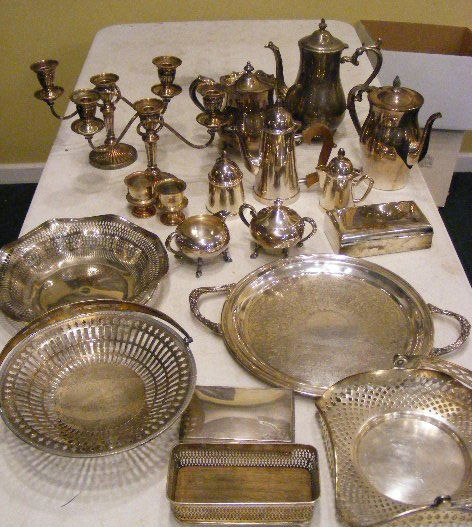 Lot of silver plated hollowware including tea set,: Lot of silver plated hollowware including tea set, trays, boxes, baskets and candelabra