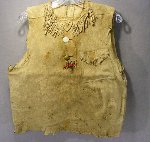 Fringed hide Native American vest, 21" long, stai: Fringed hide Native American vest, 21" long, stains