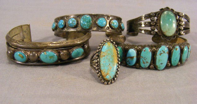 Lot of four Native American sterling silver brace: Lot of four Native American sterling silver bracelets and ring set with turquoise, 8 troy ounces total weight. Stone in ring is fractured.