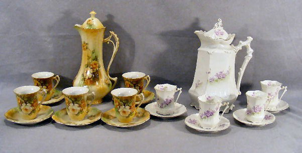 Two porcelain chocolate sets, German Weimar set wi: Two porcelain chocolate sets, German Weimar set with four cups & saucers, set with RS marks has five cups & saucers