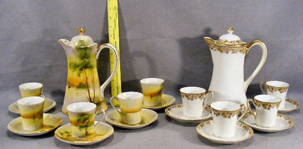 Two Nippon chocolate sets, scenic set has five cup: Two Nippon chocolate sets, scenic set has five cups & saucers (two cracked cups), floral set has four cups & saucers