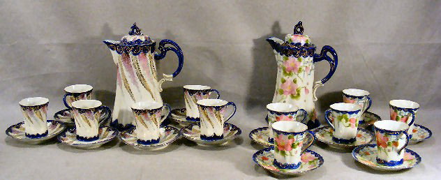 Two Japanese chocolate sets, set on left has one c: Two Japanese chocolate sets, set on left has one cup with small chip , chocolate pot has hairline, set on right with some pieces marked Nippon, one chipped and cracked saucer