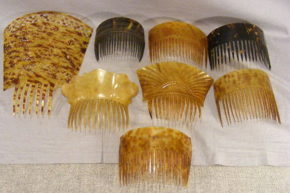 Lot of 8 hair combs, celluloid & tortoise shell, l: Lot of 8 hair combs, celluloid & tortoise shell, large comb in fine condition, others have some damage and large tortoise shell has missing end tooth