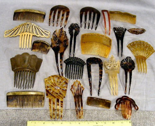 Lot of 23 celluloid and tortoise shell hair combs,: Lot of 23 celluloid and tortoise shell hair combs, one has tip of 1 tooth chipped