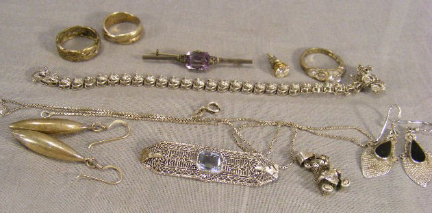 Sterling jewelry, Tiffany & Co .925 ring (missing: Sterling jewelry, Tiffany & Co .925 ring (missing stone), tennis bracelet, pins, earrings, rings, etc. 1.4 ozt