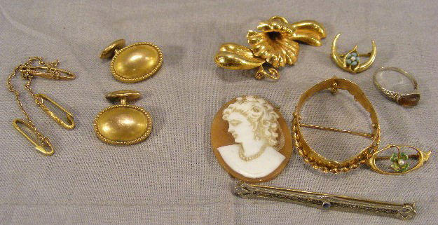 Gold lot. Cufflinks & 3 chained bar pins test as : Gold lot. Cufflinks & 3 chained bar pins test as 10k, 6.2 grams. 3 bar pins, ring, flower pin & cameo bezel are marked 10k, 12.9 grams.