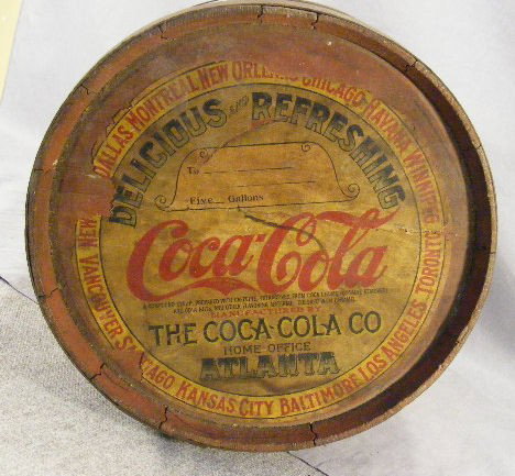 Coca - Cola barrel with original paint and label,: Coca - Cola barrel with original paint and label, 16" long, 11" diameter