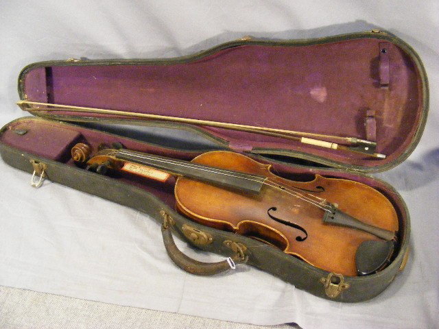 Antonius Stradivarius 1216 violin by Herman Raine: Antonius Stradivarius 1216 violin by Herman Rainer, w/ case & bow. (bow is not signed). Finish is worn.