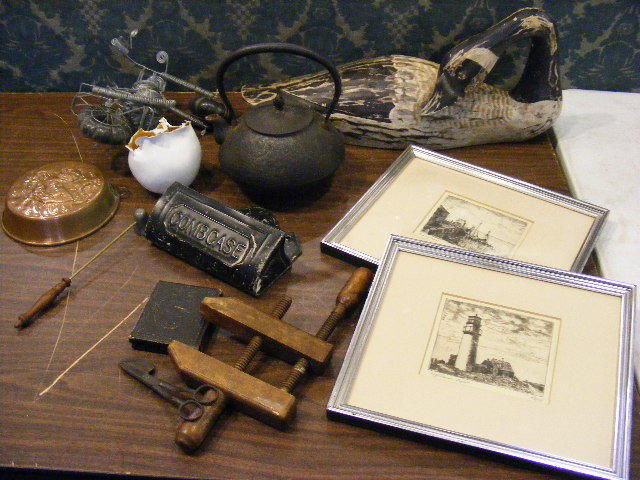 Misc. lot, 2 etchings by K. Edel, tin comb case, : Misc. lot, 2 etchings by K. Edel, tin comb case, wire motorcycle, clamp, wooden goose, tin type photo, mold, Japanese iron tea pot. Winter Sports in France poster.