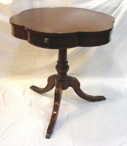 Leather top mahogany drum table, one drawer, Dunca: Leather top mahogany drum table, one drawer, Duncan Phyfe legs, 28" tall, 28" dia.