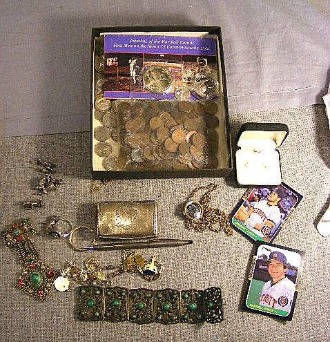 Misc. lot: Tiffany & Co sterling Cross pencil, st: Misc. lot: Tiffany & Co sterling Cross pencil, sterling charms, plated metal box (damaged). Costume jewelry. Coins: pennies, nickels, 1986 Liberty proof 1/2 dollar (no silver coin, 1 coin in box), 198