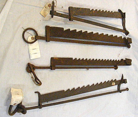 4 antique wrought iron hearth trammels. Longest m: 4 antique wrought iron hearth trammels. Longest measures 32".