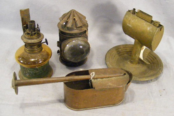Misc. lamp lot, gilders copper torch, tin lamp w/: Misc. lamp lot, gilders copper torch, tin lamp w/ saucer base, hand lantern (as is), and wall mounted lamp.
