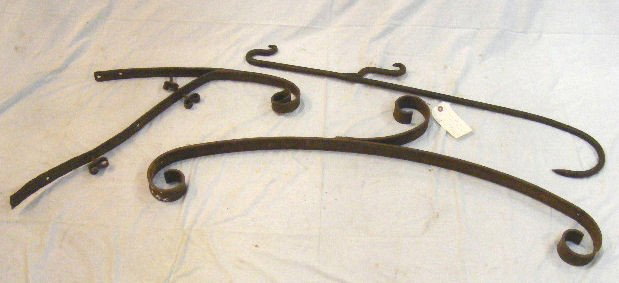 3pcs. 2 antique wrought iron sign brackets and ir: 3pcs. 2 antique wrought iron sign brackets and iron hook.