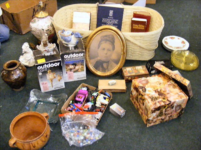 2 lots, bassinet, basket, books, nest of boxes, n: 2 lots, bassinet, basket, books, nest of boxes, napkin rings, candle holders, pair of out door lights, marbles, Asian lamp, figurines, vase, Depression glass plates, etc. Some damage.