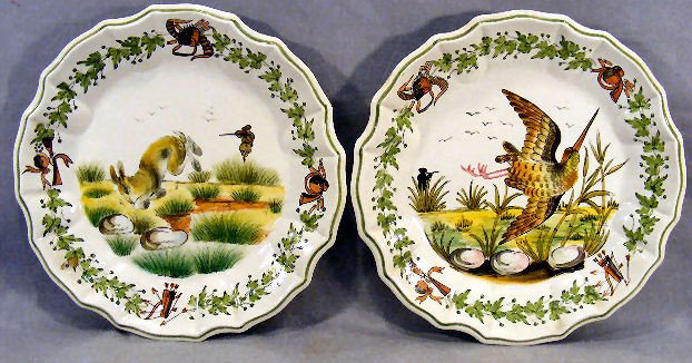 Pair of Italian faience 10.5" hand painted plates: Pair of Italian faience 10.5" hand painted plates made for Cartier