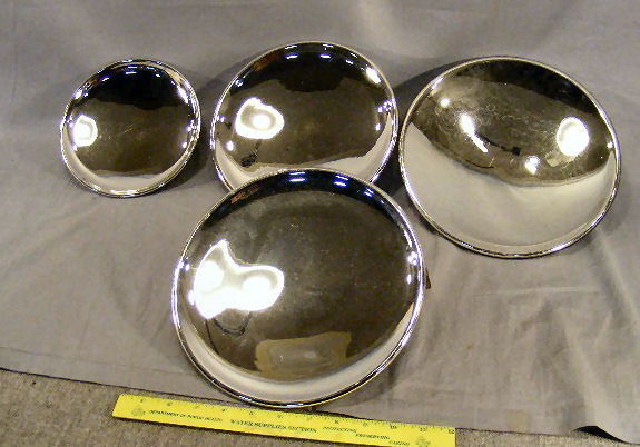 Lot of four mercury glass oil lamp reflectors: Lot of four mercury glass oil lamp reflectors, no chips or cracks, last one photographed has spotting