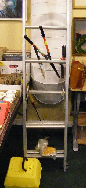 Garden tools, extension ladder, Eager Beaver chai: Garden tools, extension ladder, Eager Beaver chain saw, etc.