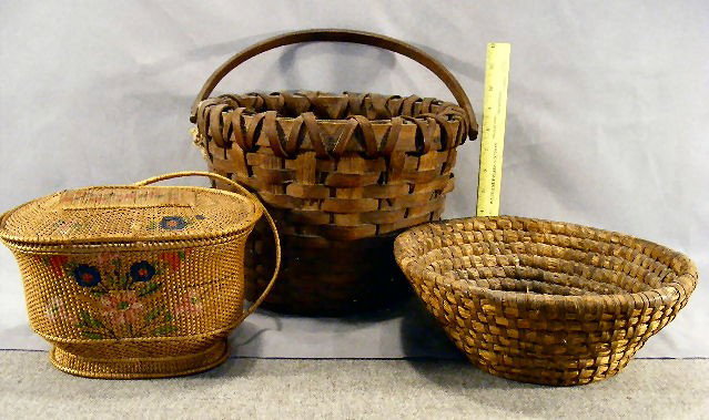 Lot of three baskets, sewing basket with hand pain: Lot of three baskets, sewing basket with hand painted décor, handle detached, Pa. coil basket and swing handled splint basket.