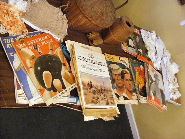 Lot of misc. items including baskets (as is), doi: Lot of misc. items including baskets (as is), doilies, napkins, table scarves, 1940's magazines, Life, Collier's, Saturday Evening Post, etc.