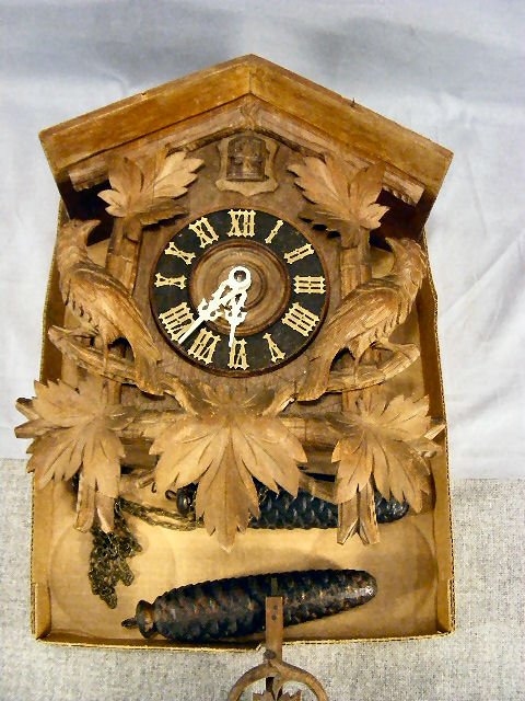 German cuckoo clock, missing top gallery.: German cuckoo clock, missing top gallery.