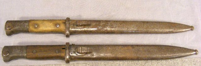 Two WWII Mauser bayonets, with 10" blades, marked: Two WWII Mauser bayonets, with 10" blades, marked as shown in photos, pitting on metal