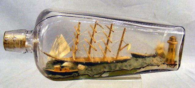 Ship in bottle diorama, bottle is 10" long, saili: Ship in bottle diorama, bottle is 10" long, sailing ship, dory, cottage, lighthouse, sailboat