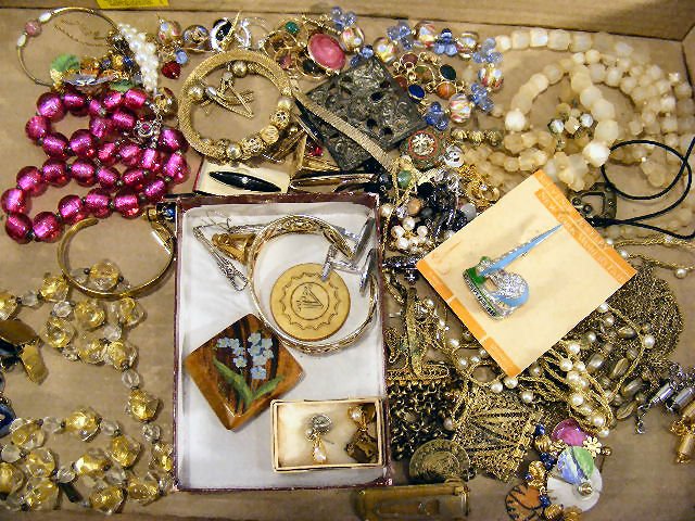 Costume jewelry. 1939 World's Fair pin on origina: Costume jewelry. 1939 World's Fair pin on original card, cuff links, necklaces, bracelets, glass beads, etc.