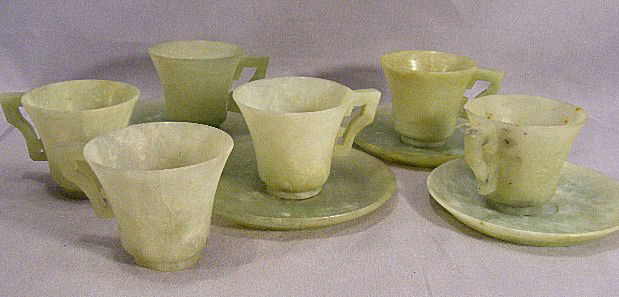 Vintage jade cups & saucers, set of 4 w/ 2 extra: Vintage jade cups & saucers, set of 4 w/ 2 extra cups. Some fissures & tight cracks in jade.