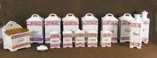 Victoria porcelain kitchen canister set, 6 large, : Victoria porcelain kitchen canister set, 6 large, 5 small, salt box & oil and vinegar bottles. Coffee canister is cracked and has cracked lid. Lid missing off one bottle.