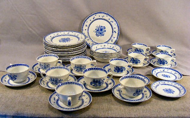 Arabia Finland Blue Flower china including 16 - 9.: Arabia Finland Blue Flower china including 16 - 9.5" plates, 5 coffee cups with 6 saucers, 7 teacups with saucers (one cup with chip on handle), one bread plate, one demitasse saucer and 5 - 6.5" bowl