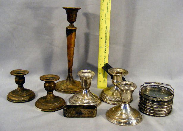 Weighted sterling, candle sticks, coasters & a st: Weighted sterling, candle sticks, coasters & a sterling napkin ring.