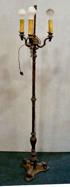 3 light brass / bronze floor lamp. Circa 1940's.: 3 light brass / bronze floor lamp. Circa 1940's. Worn finish. 57" tall.