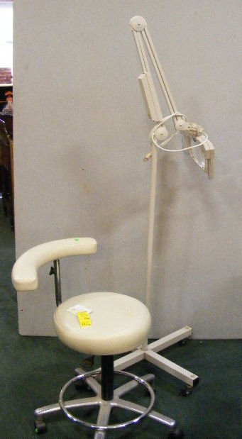2pcs. Luxo floor model lighted magnifier w/ 2 lig: 2pcs. Luxo floor model lighted magnifier w/ 2 lights & Air Body swing arm doctor's chair.