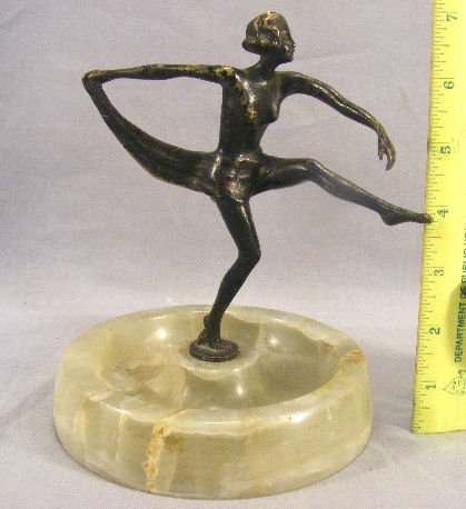 Bronze art deco figurine mounted on onyx base: Bronze art deco figurine mounted on onyx base