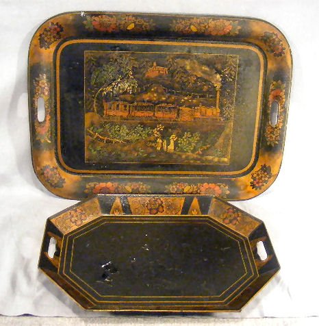 Two tole trays, 22" tray with stenciled train deco: Two tole trays, 22" tray with stenciled train decoration, surface pebbled, and 17.5" tray with damaged finish on bottom top surface. Name painted on bottom of each