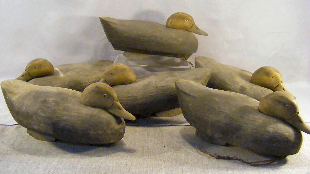 Lot of six identical carved duck decoys, 15" long,: Lot of six identical carved duck decoys, 15" long, normal wear from use, glass eyes, no marks
