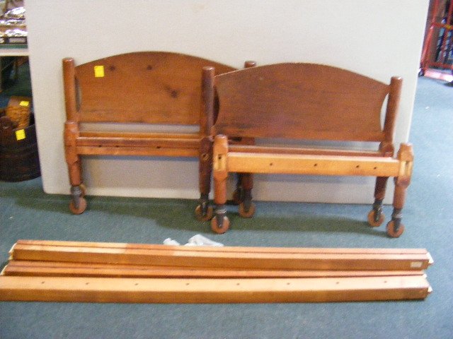 Pair of Shaker cots with rails, original wheels &: Pair of Shaker cots with rails, original wheels & hardware, head and foot boards measure 36" wide, head boards measure 30.75" high. Measure 73" long. From Granby, Ct. home. Together with ladder back r