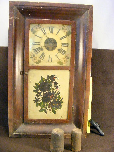 Antique ogee clock, no pendulum, some paint missi: Antique ogee clock, no pendulum, some paint missing form door, sold as is, 26" X 15"